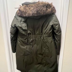 The North Face Womens size L parka with fur wrapped hood.